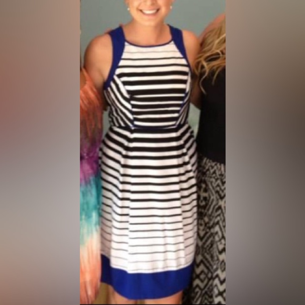 Massimo size 6 black and white striped dress with royal blue trim detail.